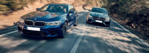 BMW & Mercedes Cars Driving On Road